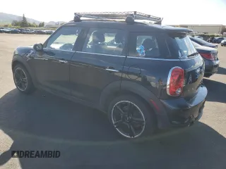 2016 MINI Countryman S with VIN WMWZC3C54GWT08932, listed as a Copart auction lot 51185955 with 101,023 mi miles and Salvage Title. Bid and sale history available at DreamBid. Image 2.