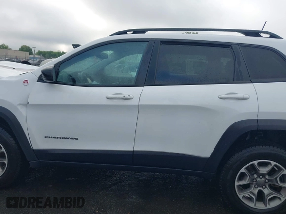 2022 Jeep Cherokee Trailhawk with VIN 1C4PJMBX1ND500729, listed as a IAAI auction lot 42235098 with 60,354 mi miles and . Bid and sale history available at DreamBid. Image 14.