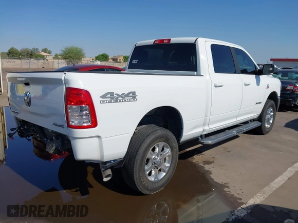2021 Ram 2500 Big Horn with VIN 3C6UR5DL1MG676863, listed as a IAAI auction lot 42386260 with 105,328 mi miles and . Bid and sale history available at DreamBid. Image 4.