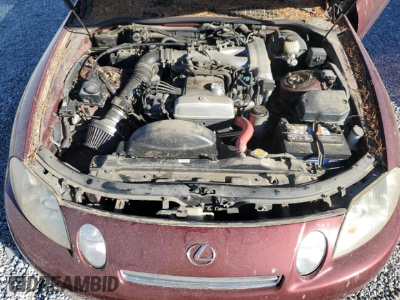 1997 Lexus SC 300 z VIN JT8CD32Z1V0040141, wystawiony jako Copart lot #85372924 z przebiegiem Nie podano mil oraz Szkody całkowita. Historia ofert i sprzedaży dostępna na DreamBid. Obrazek 11.