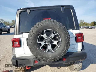 2022 Jeep Wrangler Unlimited Rubicon с VIN 1C4HJXFN3NW193177, выставлен на аукционе Copart как лот 82002224 с пробегом 34 762 миль миль и Списание • Salvage title. История ставок и продаж доступна на DreamBid. Изображение 6.