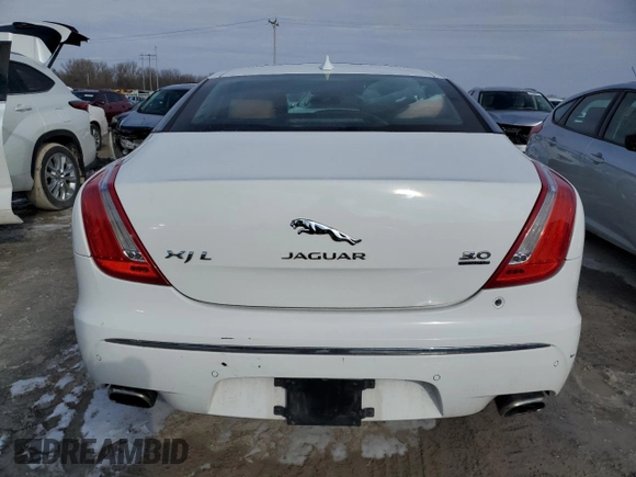 2015 Jaguar XJ Portfolio z VIN SAJWJ2GD5F8V77355, wystawiony jako Copart lot #47214835 z przebiegiem 73 202 mil mil oraz Szkoda całkowita • Salvage title. Historia ofert i sprzedaży dostępna na DreamBid. Obrazek 6.