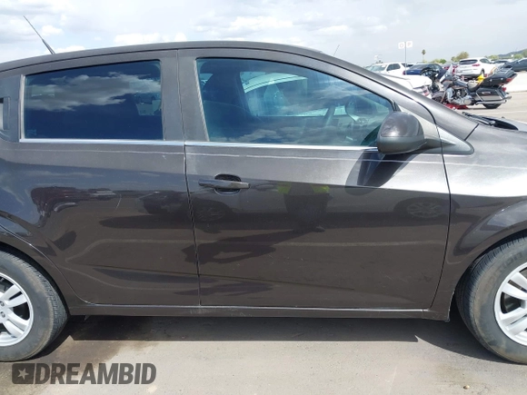 2014 Chevrolet Sonic LT with VIN 1G1JC6SHXE4135948, listed as a IAAI auction lot 41949833 with 127,202 mi miles. Bid and sale history available at carsss.com. Image 14.