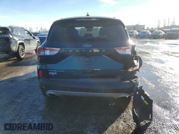 2020 Ford Escape Titanium Hybrid with VIN 1FMCU9DZXLUB46252, listed as a Copart auction lot 88801835 with 64,443 mi miles and Salvage title. Bid and sale history available at DreamBid. Image 6.