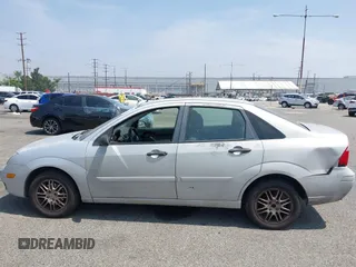 2007 Ford Focus S with VIN 1FAFP34N37W322481, listed as a IAAI auction lot 42490088 with 280,727 mi miles and . Bid and sale history available at DreamBid. Image 14.