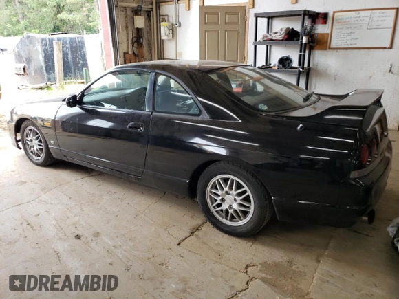 1997 Nissan Skyline z VIN HR33101590, wystawiony jako Copart lot #68650354 z przebiegiem 76 082 mil mil oraz Szkoda całkowita • Salvage title. Historia ofert i sprzedaży dostępna na DreamBid. Obrazek 2.