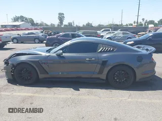 2019 Ford Mustang EcoBoost with VIN 1FA6P8TH5K5181274, listed as a IAAI auction lot 42719275 with 91,605 mi miles and . Bid and sale history available at DreamBid. Image 14.