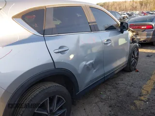 2018 Mazda CX-5 Touring with VIN JM3KFBCM6J0363767, listed as a IAAI auction lot 41776614 with 139,507 mi miles. Bid and sale history available at carsss.com. Image 19.