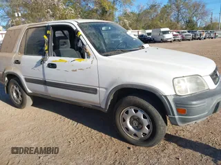 1999 Honda CR-V LX with VIN JHLRD284XXC020668, listed as a IAAI auction lot 41842024 with 224,359 mi miles. Bid and sale history available at carsss.com. Image 1.
