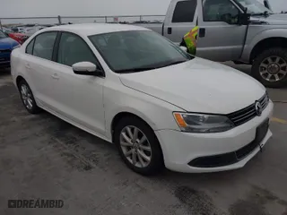 2013 Volkswagen Jetta Sedan SE with VIN 3VWDX7AJ1DM374789, listed as a IAAI auction lot 41957918 with 230,052 mi miles. Bid and sale history available at carsss.com. Image 1.