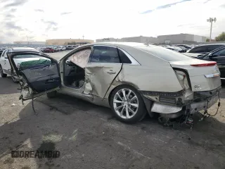2014 Cadillac XTS Luxury with VIN 2G61M5S31E9314477, listed as a Copart auction lot 43562705 with 136,469 mi miles and Salvage Title. Bid and sale history available at DreamBid. Image 2.
