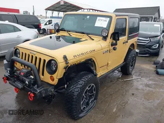 2013 Jeep Wrangler Rubicon 10th Anniversary with VIN 1C4BJWCG5DL688504, listed as a IAAI auction lot 41797184 with 109,414 mi miles and . Bid and sale history available at DreamBid. Image 17.