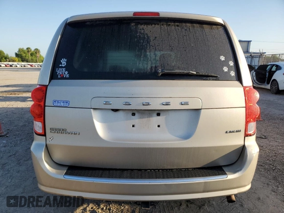 2013 Dodge Grand Caravan Crew with VIN 2C4RDGDG4DR567707, listed as a Copart auction lot 52731005 with 210,359 mi miles and Salvage Title. Bid and sale history available at DreamBid. Image 6.