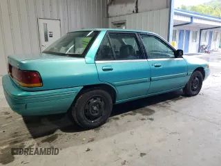 1995 Ford Escort z VIN 3FASP13J7SR205967, wystawiony jako Copart lot #73087444 z przebiegiem 100 401 mil mil oraz Szkoda całkowita • Salvage title. Historia ofert i sprzedaży dostępna na DreamBid. Obrazek 3.