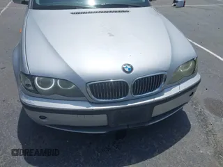 2002 BMW 3 Series 325i with VIN WBAET37452NG73105, listed as a IAAI auction lot 42105774 with 202,852 mi miles. Bid and sale history available at carsss.com. Image 13.