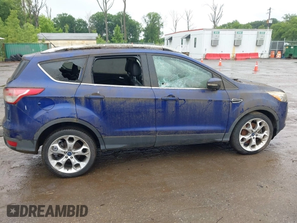 2016 Ford Escape Titanium with VIN 1FMCU9J95GUB65432, listed as a IAAI auction lot 42503176 with 96,362 mi miles and . Bid and sale history available at DreamBid. Image 12.