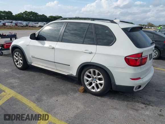 2011 BMW X5 35i with VIN 5UXZV4C54BL412770, listed as a IAAI auction lot 41618946 with 148,612 mi miles. Bid and sale history available at carsss.com. Image 3.
