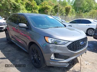 2021 Ford Edge SEL z VIN 2FMPK4J96MBA64797, wystawiony jako IAAI lot #42098228 z przebiegiem 89 707 mil mil oraz . Historia ofert i sprzedaży dostępna na DreamBid. Obrazek 1.