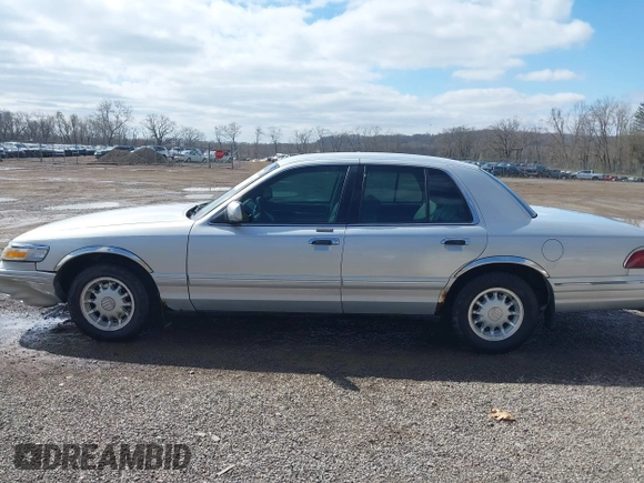 1997 Mercury Grand Marquis LS with VIN 2MELM75W3VX717801, listed as a IAAI auction lot 41920075 with 173,730 mi miles and . Bid and sale history available at DreamBid. Image 14.