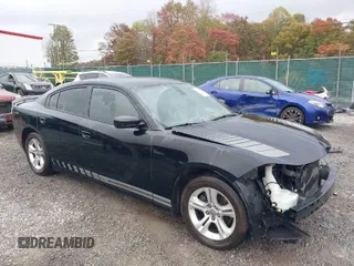 2020 Dodge Charger SXT with VIN 2C3CDXBGXLH116282, listed as a IAAI auction lot 40590594 with 75,345 mi miles. Bid and sale history available at carsss.com. Image 1.