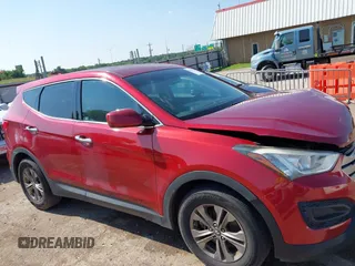 2014 Hyundai Santa Fe with VIN 5XYZT3LB1EG134837, listed as a IAAI auction lot 42454126 with 118,225 mi miles and . Bid and sale history available at DreamBid. Image 14.