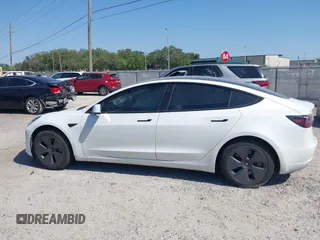 2022 Tesla Model 3 Long Range with VIN 5YJ3E1EB1NF116850, listed as a IAAI auction lot 42062677 with 48,744 mi miles and . Bid and sale history available at DreamBid. Image 13.