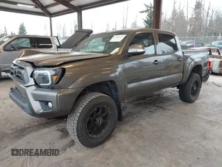 2013 Toyota Tacoma z VIN 3TMLU4EN9DM124980, wystawiony jako IAAI lot #41576747 z przebiegiem 209 883 mil mil oraz . Historia ofert i sprzedaży dostępna na DreamBid. Obrazek 17.