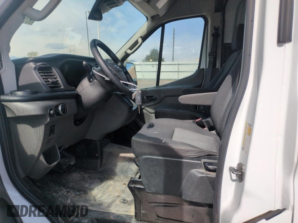 2023 Ford Transit with VIN 1FTBF8C88PKC07161, listed as a Copart auction lot 51319765 with 10,384 mi miles and Salvage Title. Bid and sale history available at DreamBid. Image 7.
