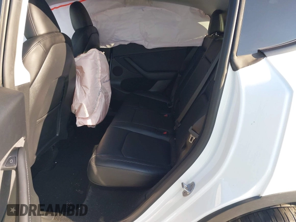 2023 Tesla Model Y Long Range with VIN 7SAYGDEE3PF817097, listed as a IAAI auction lot 41767294 with 64,047 mi miles and . Bid and sale history available at DreamBid. Image 8.