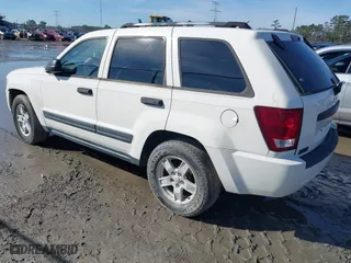 2005 Jeep Grand Cherokee Laredo with VIN 1J4GS48N75C505209, listed as a IAAI auction lot 41452637 with 263,653 mi miles. Bid and sale history available at carsss.com. Image 3.