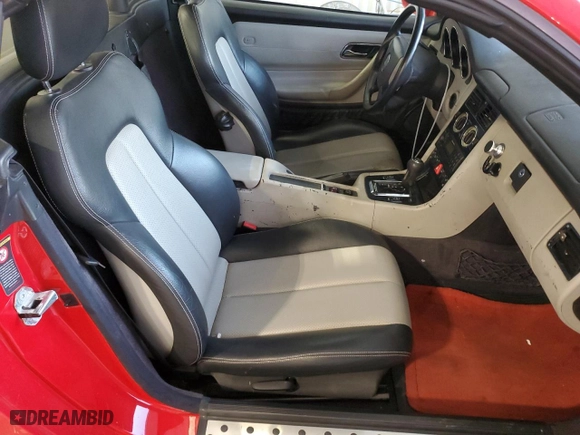 2000 Mercedes-Benz SLK-Class Kompressor with VIN WDBKK47F8YF150465, listed as a Copart auction lot 82610754 with 87,581 mi miles and Clean Title. Bid and sale history available at carsss.com. Image 10.