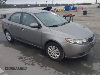 2011 Kia Forte EX with VIN KNAFU4A25B5441194, listed as a IAAI auction lot 42076839 with 91,706 mi miles. Bid and sale history available at carsss.com. Image 1.