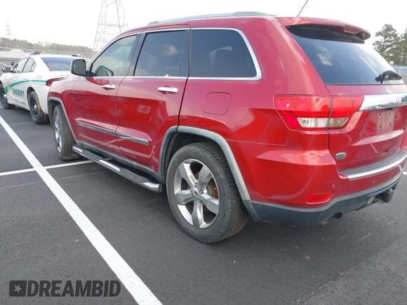 2011 Jeep Grand Cherokee Overland with VIN 1J4RS6GT4BC561169, listed as a IAAI auction lot 41847912 with 220,713 mi miles and . Bid and sale history available at DreamBid. Image 3.