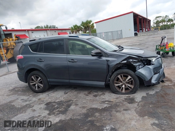 2017 Toyota RAV4 XLE with VIN JTMWFREVXHD096998, listed as a IAAI auction lot 41997925 with 119,564 mi miles and . Bid and sale history available at DreamBid. Image 13.
