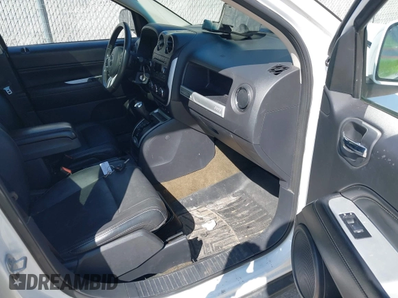 2016 Jeep Compass High Altitude with VIN 1C4NJDEB4GD767731, listed as a IAAI auction lot 41977400 with 99,890 mi miles and . Bid and sale history available at DreamBid. Image 5.