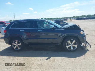2015 Jeep Grand Cherokee High Altitude with VIN 1C4RJFCG5FC807394, listed as a IAAI auction lot 42452034 with 72,011 mi miles and . Bid and sale history available at DreamBid. Image 14.
