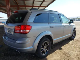 2017 Dodge Journey SE with VIN 3C4PDCABXHT586922, listed as a IAAI auction lot 41711047 with 114,118 mi miles and . Bid and sale history available at DreamBid. Image 4.