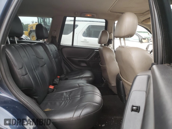 2002 Jeep Grand Cherokee z VIN 1J4GX38S42C229150, wystawiony jako Copart lot #72586834 z przebiegiem 201 103 mil mil oraz Szkoda całkowita • Salvage title. Historia ofert i sprzedaży dostępna na DreamBid. Obrazek 10.