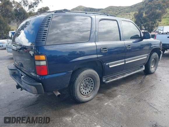 2005 Chevrolet Tahoe LT with VIN 1GNEC13T15R213638, listed as a IAAI auction lot 41787524 with 153,709 mi miles and . Bid and sale history available at DreamBid. Image 4.