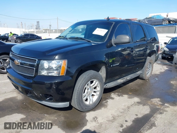 2007 Chevrolet Tahoe LTZ with VIN 1GNFC13J37R134588, listed as a IAAI auction lot 41725727 with 127,540 mi miles and . Bid and sale history available at DreamBid. Image 2.