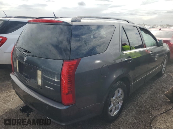 2009 Cadillac SRX RWD z VIN 1GYEE637790101241, wystawiony jako Copart lot #78983654 z przebiegiem Nie podano mil oraz Szkoda całkowita • Salvage title. Historia ofert i sprzedaży dostępna na DreamBid. Obrazek 3.