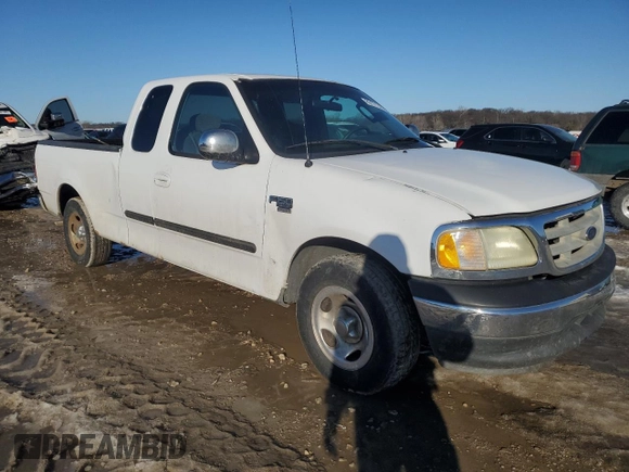 2002 Ford F-150 XL with VIN 1FTRX17L42KD35973, listed as a Copart auction lot 89121325 with 258,895 mi miles and Salvage title. Bid and sale history available at DreamBid. Image 4.