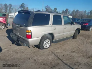 2004 Chevrolet Tahoe LT with VIN 1GNEK13Z74R106289, listed as a IAAI auction lot 41470666 with 211,641 mi miles. Bid and sale history available at carsss.com. Image 4.