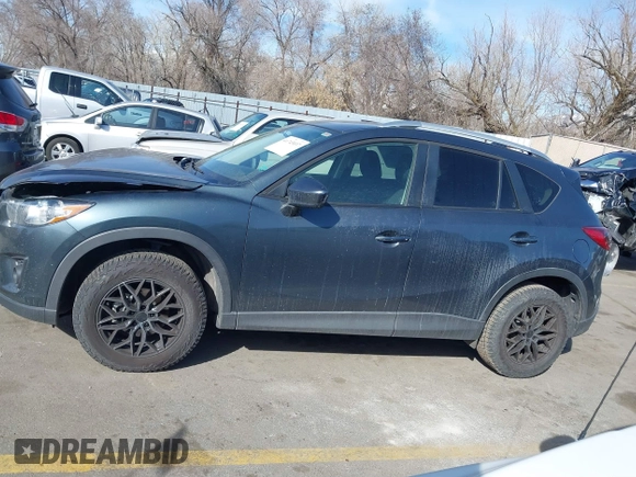 2013 Mazda CX-5 Touring with VIN JM3KE2CE6D0122405, listed as a IAAI auction lot 41743037 with 154,647 mi miles and . Bid and sale history available at carsss.com. Image 15.