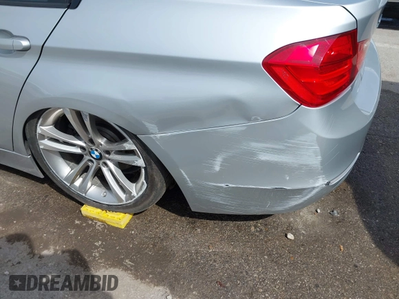 2014 BMW 3 Series 328i xDrive with VIN WBA3B5C51EP543588, listed as a IAAI auction lot 42105211 with 117,717 mi miles and . Bid and sale history available at DreamBid. Image 6.