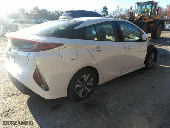 2017 Toyota Prius Prime Plus with VIN JTDKARFP2H3030447, listed as a IAAI auction lot 36566571 with 101,954 mi miles. Bid and sale history available at carsss.com. Image 4.