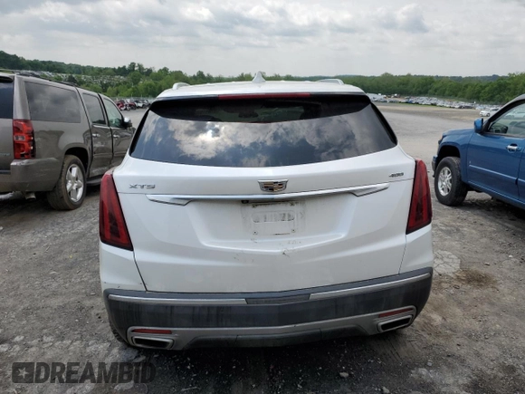 2020 Cadillac XT5 Premium Luxury FWD with VIN 1GYKNCRS5LZ229686, listed as a Copart auction lot 57391915 with 54,491 mi miles and Salvage title. Bid and sale history available at DreamBid. Image 6.