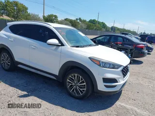 2020 Hyundai Tucson SEL z VIN KM8J33ALXLU197516, wystawiony jako IAAI lot #41857132 z przebiegiem 27 350 mil mil oraz . Historia ofert i sprzedaży dostępna na DreamBid. Obrazek 1.