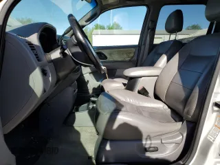 2002 Ford Escape XLT Choice with VIN 1FMCU04162KB00207, listed as a Copart auction lot 56414275 with 143,085 mi miles and Salvage title. Bid and sale history available at DreamBid. Image 7.