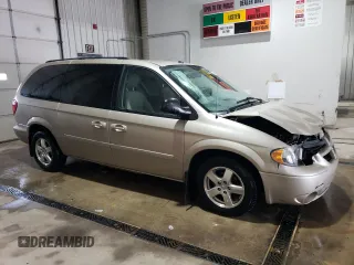 2007 Dodge Grand Caravan SXT with VIN 2D8GP44L57R321927, listed as a Copart auction lot 53143605 with 157,185 mi miles and Salvage Title. Bid and sale history available at DreamBid. Image 4.